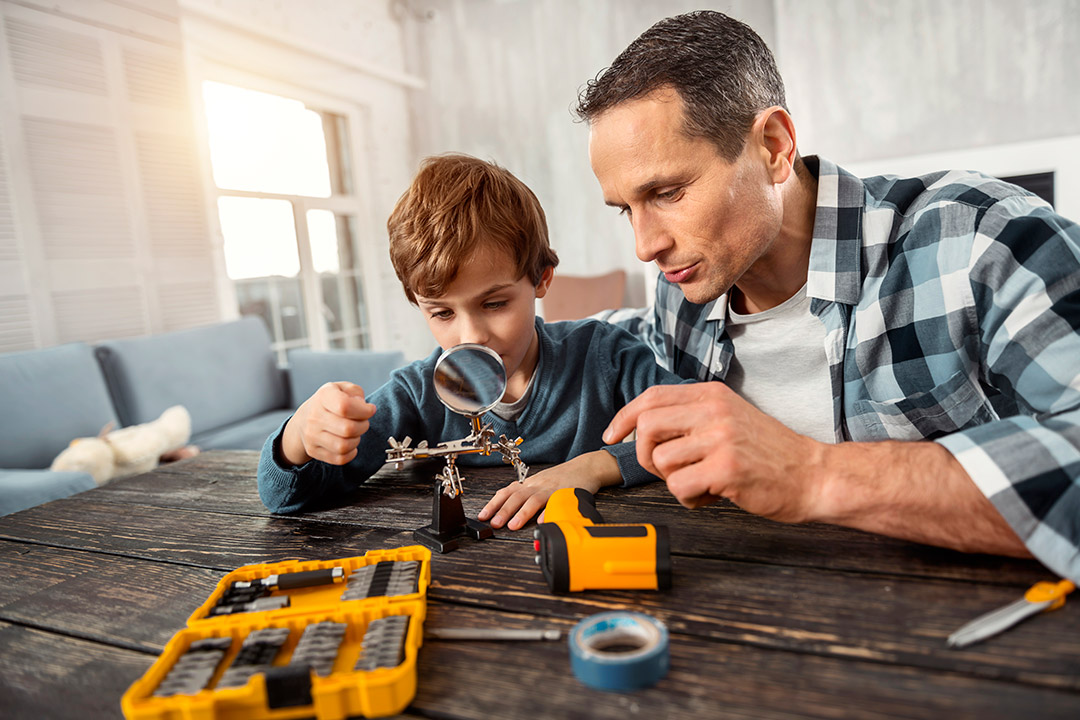 a child playing with his father